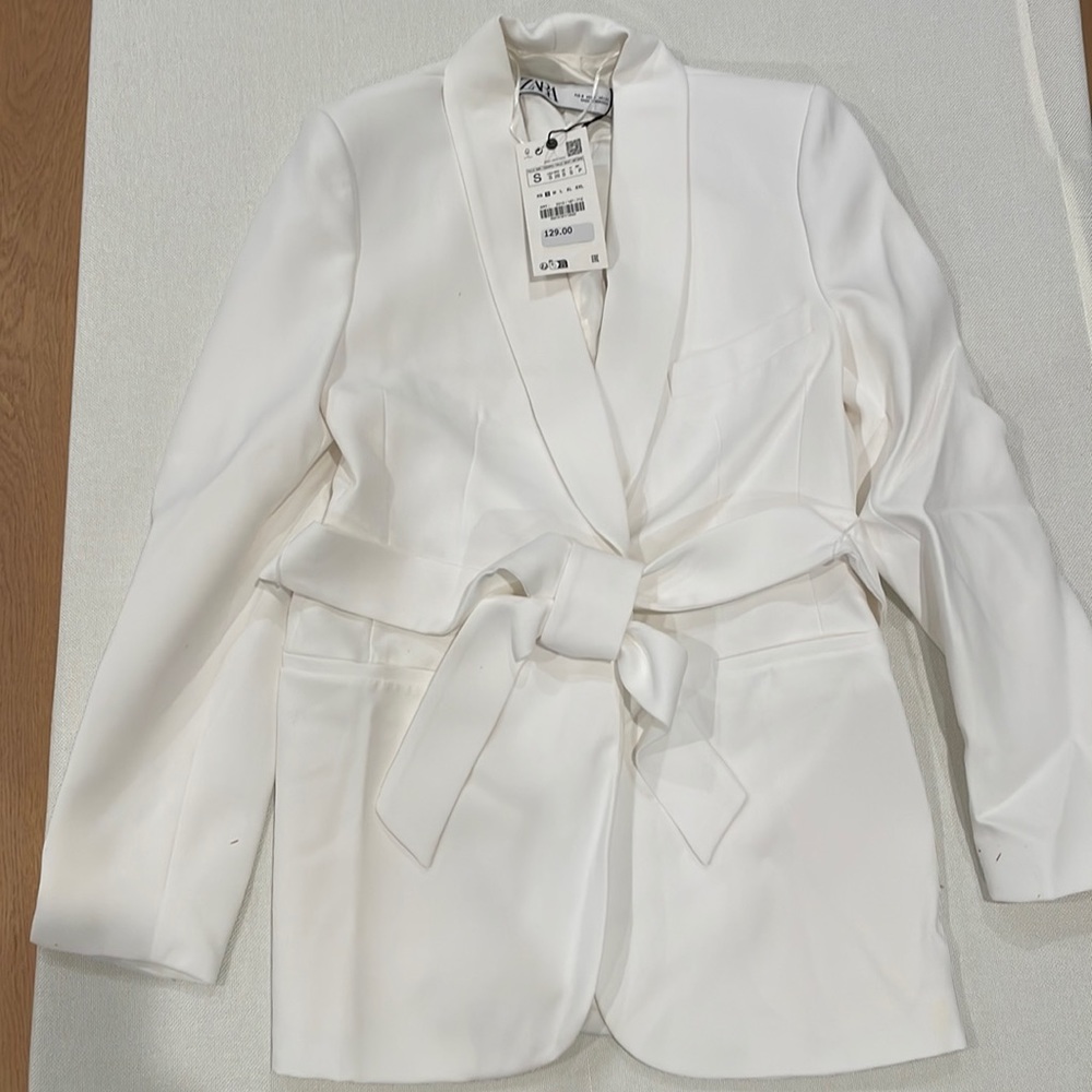 Zara women’s white blazer with belt detail.  Brand new.  Tags attached